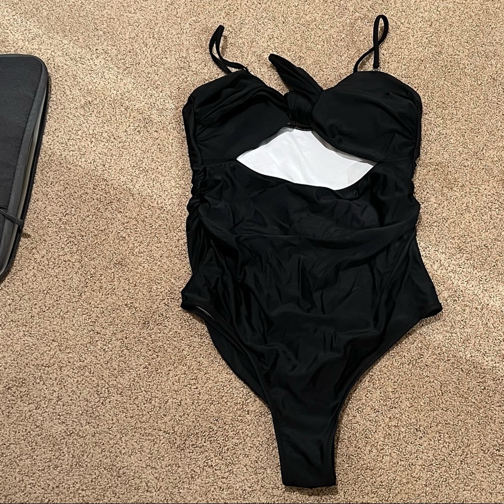 Black one piece size M/L swim suit